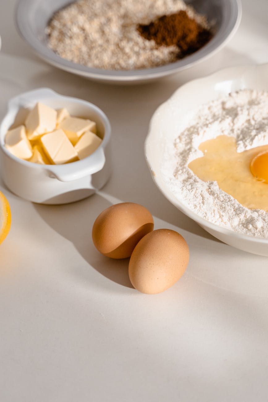Fast Factory Removal Made Effortless - Top Tips for Success Flour, eggs, and butter ready for a homemade baking recipe, creating a rustic kitchen vibe.