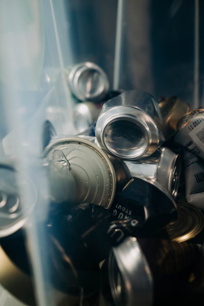 Recycling Made Effortless: Sort Recyclables Easily for Eco-Friendly Waste Removal An assortment of tin cans ready for recycling. Eco-friendly waste management concept.